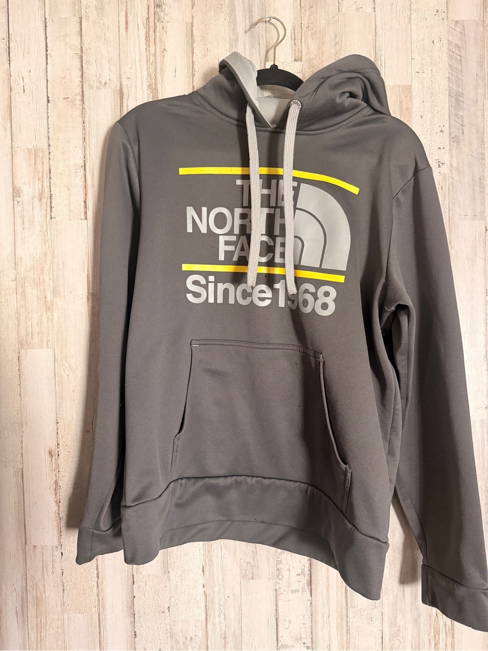 The North Face Gray Pullover Hoodie with Yellow Accent